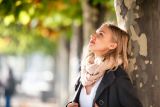 1793364929_woman-under-colorful-autumn-leaves-Depositphotos_175499848_S.jpg