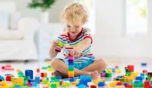 depositphotos_252766576-stock-photo-child-playing-with-toy-blocks.jpg
