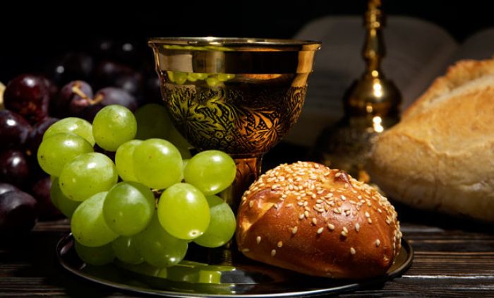 1708764479_677z381_eucharist-with-wine-chalice-grapes.jpg