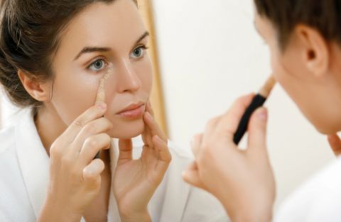 1793184639_woman-using-concealer-eye-circles-Depositphotos_203222900_S.jpg