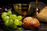 1708764479_677z381_eucharist-with-wine-chalice-grapes.jpg