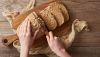 1793198392_top-view-woman-cutting-bread-Depositphotos_271250834_S-1-.jpg