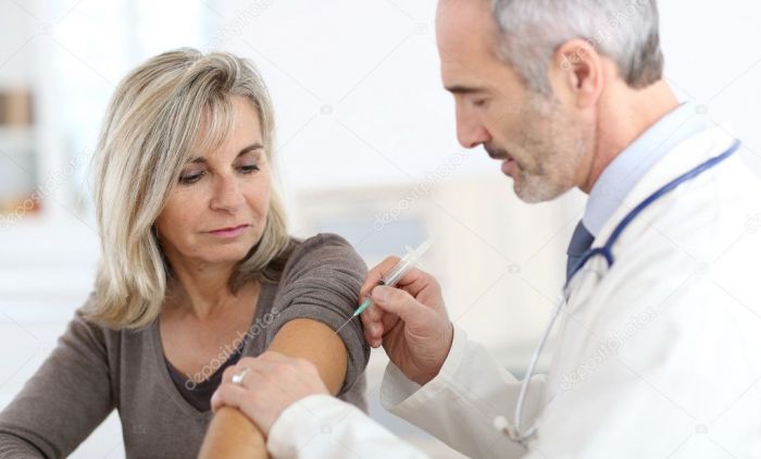 depositphotos_36648713-stock-photo-doctor-injecting-vaccine.jpg